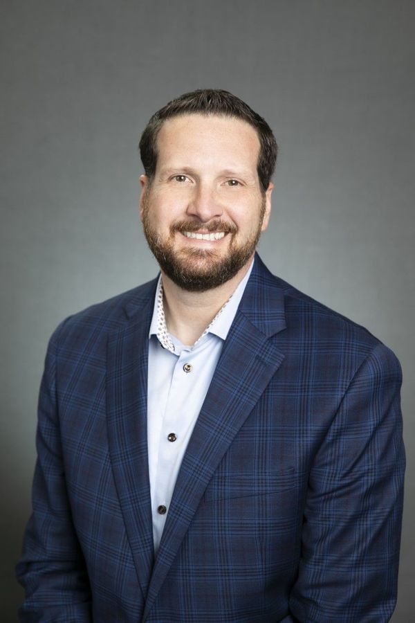 Adam R. Shores